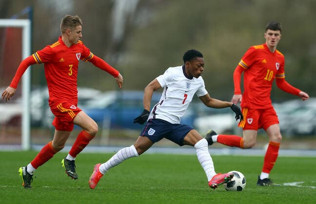 Mandatory Credit: Photo by Kieran McManus BPI Shutterstock (11836061c) Karamoko Dembele of England Under 18s goes past Tom Davies of Wales Under 18s Wales U18 v England U18, International Friendly, Länderspiel, Nationalmannschaft Football, The Leckwith Stadium, Cardiff, UK - 29 Mar 2021 EDITORIAL USE ONLY No use with unauthorised audio, video, data, fixture lists, club league logos or live services. Online in-match use limited to 120 images, no video emulation. No use in betting, games or single club league player publications. Wales U18 v England U18, International Friendly, Football, The Leckwith Stadium, Cardiff, UK - 29 Mar 2021 EDITORIAL USE ONLY No use with unauthorised audio, video, data, fixture lists, club league logos or live services. Online in-match use limited to 120 images, no video emulation. No use in betting, games or single club league player publications. Copyright: xKieranxMcManus BPI Shutterstockx 11836061c