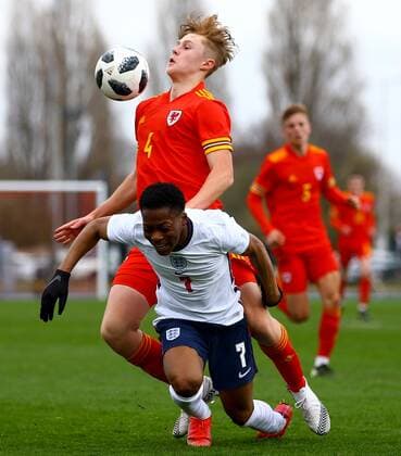 Mandatory Credit: Photo by Kieran McManus BPI Shutterstock (11836061da) Karamoko Dembele of England Under 18s is fouled by Harry Jones of Wales Under 18s Wales U18 v England U18, International Friendly, Länderspiel, Nationalmannschaft Football, The Leckwith Stadium, Cardiff, UK - 29 Mar 2021 EDITORIAL USE ONLY No use with unauthorised audio, video, data, fixture lists, club league logos or live services. Online in-match use limited to 120 images, no video emulation. No use in betting, games or single club league player publications. Wales U18 v England U18, International Friendly, Football, The Leckwith Stadium, Cardiff, UK - 29 Mar 2021 EDITORIAL USE ONLY No use with unauthorised audio, video, data, fixture lists, club league logos or live services. Online in-match use limited to 120 images, no video emulation. No use in betting, games or single club league player publications. Copyright: xKieranxMcManus BPI Shutterstockx 11836061da