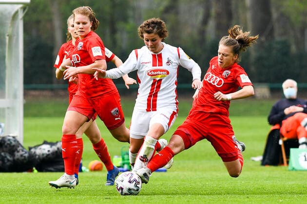 v.li.: Anja Pfluger (Köln, 20), Stefanie Reischmann (FC Ingolstadt, 21), Zweikampf, Duell, duel, tackle, tackling, Dynamik, Action, Aktion, 21.04.2021, Köln (Deutschland), Fussball, 2. Frauen-Bundesliga Süd, 1. FC Köln - FC Ingolstadt, DFB DFL REGULATIONS PROHIBIT ANY USE OF PHOTOGRAPHS AS IMAGE SEQUENCES AND OR QUASI-VIDEO.
