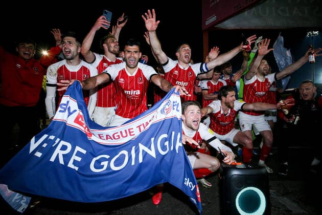 Mandatory Credit: Photo by Robbie Stephenson JMP Shutterstock (11878432dg) Cheltenham Town celebrate promotion out of Sky Bet League Two into Sky Bet League One with fans Cheltenham Town v Carlisle United, UK - 27 Apr 2021 EDITORIAL USE ONLY No use with unauthorised audio, video, data, fixture lists (outside the EU), club league logos or live services. Online in-match use limited to 45 images (+15 in extra time). No use to emulate moving images. No use in betting, games or single club league player publications services. Cheltenham Town v Carlisle United, UK - 27 Apr 2021 EDITORIAL USE ONLY No use with unauthorised audio, video, data, fixture lists (outside the EU), club league logos or live services. Online in-match use limited to 45 images (+15 in extra time). No use to emulate moving images. No use in betting, games or Copyright: xRobbiexStephenson JMP Shutterstockx 11878432dg