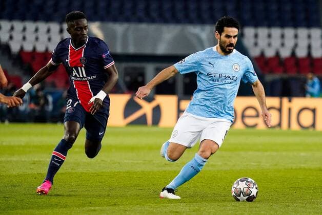 Mandatory Credit: Photo by Dave Winter BPI Shutterstock (11879081ac) Ilkay Gundogan of Manchester City and Idrissa Gueye of PSG Paris Saint Germain v Manchester City, UEFA Champions League, Semi Final, First Leg, Football, Parc Des Princes, Paris, France - 28 Apr 2021 EDITORIAL USE ONLY No use with unauthorised audio, video, data, fixture lists, club league logos or live services. Online in-match use limited to 120 images, no video emulation. No use in betting, games or single club league player publications. Paris Saint Germain v Manchester City, UEFA Champions League, Semi Final, First Leg, Football, Parc Des Princes, Paris, France - 28 Apr 2021 EDITORIAL USE ONLY No use with unauthorised audio, video, data, fixture lists, club league logos or live services. Online in-match use limited to 120 images, no video emulation. No use in betting, games or single club league player publications. Copyright: xDavexWinter BPI Shutterstockx 11879081ac
