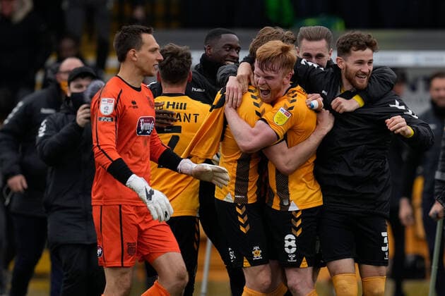 Mandatory Credit: Photo by Joe Toth BPI Shutterstock (11893216eh) Cambridge United players celebrate winning promotion to EFL Sky Bet League One Cambridge United v Grimsby Town, EFL Sky Bet League Two, Football, The Abbey Stadium, Cambridge, UK - 08 May 2021 EDITORIAL USE ONLY No use with unauthorised audio, video, data, fixture lists, club league logos or live services. Online in-match use limited to 120 images, no video emulation. No use in betting, games or single club league player publications. Cambridge United v Grimsby Town, EFL Sky Bet League Two, Football, The Abbey Stadium, Cambridge, UK - 08 May 2021 EDITORIAL USE ONLY No use with unauthorised audio, video, data, fixture lists, club league logos or live services. Online in-match use limited to 120 images, no video emulation. No use in betting, games or single club league player publications. Copyright: xJoexToth BPI Shutterstockx 11893216eh