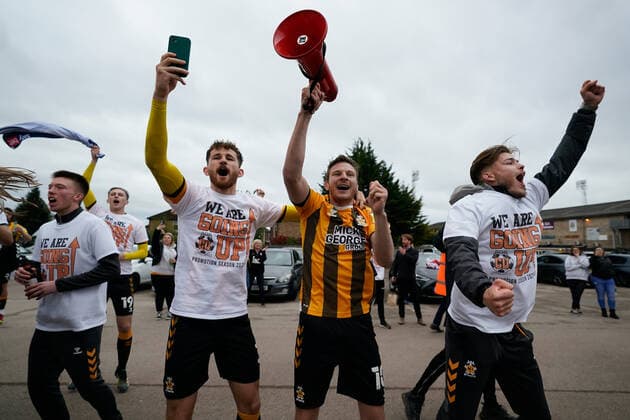 Mandatory Credit: Photo by Joe Toth BPI Shutterstock (11893216gl) Paul Mullin of Cambridge United (10) and Jack Iredale of Cambridge United (3) celebrate winning promotion to EFL Sky Bet League One in the parking lot of The Abbey Stadium where fans have congregated outside Cambridge United v Grimsby Town, EFL Sky Bet League Two, Football, The Abbey Stadium, Cambridge, UK - 08 May 2021 EDITORIAL USE ONLY No use with unauthorised audio, video, data, fixture lists, club league logos or live services. Online in-match use limited to 120 images, no video emulation. No use in betting, games or single club league player publications. Cambridge United v Grimsby Town, EFL Sky Bet League Two, Football, The Abbey Stadium, Cambridge, UK - 08 May 2021 EDITORIAL USE ONLY No use with unauthorised audio, video, data, fixture lists, club league logos or live services. Online in-match use limited to 120 images, no video emulation. No use in betting, games or single club league player publications. Copyright: xJoexToth BPI Shutterstockx 11893216gl