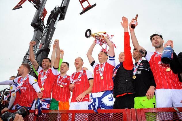 Mandatory Credit: Photo by Nizaam Jones JMP Shutterstock (11894506cx) Cheltenham Town celebrate after winning the league Cheltenham Town v Harrogate Town, UK - 08 May 2021 EDITORIAL USE ONLY No use with unauthorised audio, video, data, fixture lists (outside the EU), club league logos or live services. Online in-match use limited to 45 images (+15 in extra time). No use to emulate moving images. No use in betting, games or single club league player publications services. Cheltenham Town v Harrogate Town, UK - 08 May 2021 EDITORIAL USE ONLY No use with unauthorised audio, video, data, fixture lists (outside the EU), club league logos or live services. Online in-match use limited to 45 images (+15 in extra time). No use to emulate moving images. No use in betting, games or Copyright: xNizaamxJones JMP Shutterstockx 11894506cx