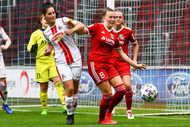 v.li.: Karoline Kohr (Köln, 13), Alena Wolf (FFC Niederkirchen, 8), Zweikampf, Duell, duel, tackle, tackling, Dynamik, Action, Aktion, 03.06.2021, Köln (Deutschland), Fussball, 2. Frauen-Bundesliga Süd, 1. FC Köln - 1. FFC Niederkirchen, DFB DFL REGULATIONS PROHIBIT ANY USE OF PHOTOGRAPHS AS IMAGE SEQUENCES AND OR QUASI-VIDEO.
