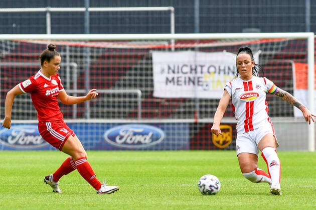 v.li.: Ena Taslidza (FFC Niederkirchen, 14), Peggy Kuznik (Köln, 21), Zweikampf, Duell, duel, tackle, tackling, Dynamik, Action, Aktion, 03.06.2021, Köln (Deutschland), Fussball, 2. Frauen-Bundesliga Süd, 1. FC Köln - 1. FFC Niederkirchen, DFB DFL REGULATIONS PROHIBIT ANY USE OF PHOTOGRAPHS AS IMAGE SEQUENCES AND OR QUASI-VIDEO.