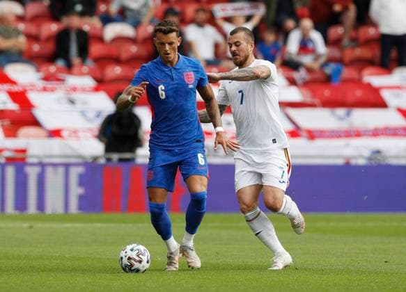 Middlesbrough, England, 6th June 2021. Ben White of England tackled by Denis Alibec of Romania during the International Friendly, Länderspiel, Nationalmannschaft match at the Riverside Stadium, Middlesbrough. Picture credit should read: Darren Staples Sportimage EDITORIAL USE ONLY. No use with unauthorised audio, video, data, fixture lists, club league logos or live services. Online in-match use limited to 120 images, no video emulation. No use in betting, games or single club league player publications. SPI-1079-0027