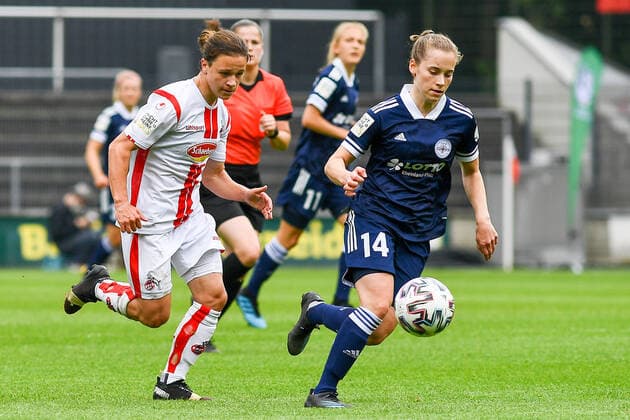 v.li.: Alicia-Sophie Gudorf (Köln, 12), Carolin Dillenburg (SG 99 Andernach, 14), Zweikampf, Duell, duel, tackle, tackling, Dynamik, Action, Aktion, 06.06.2021, Köln (Deutschland), Fussball, 2. Frauen-Bundesliga Süd, 1. FC Köln - SG 99 Andernach, DFB DFL REGULATIONS PROHIBIT ANY USE OF PHOTOGRAPHS AS IMAGE SEQUENCES AND OR QUASI-VIDEO.