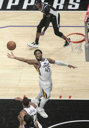 June 18, 2021, Los Angeles, California, USA: Donovan Mitchell 45 of the Utah Jazz reaches for an offensive rebound during Round 2, Game 6 of the 2021 NBA, Basketball Herren, USA Playoffs against the Los Angeles Clippers on Friday June 18, 2021, at the Staples Center in Los Angeles, California. PI Los Angeles USA - ZUMAp124 20210618_zaa_p124_005 Copyright: xPHILLIPxKIMx