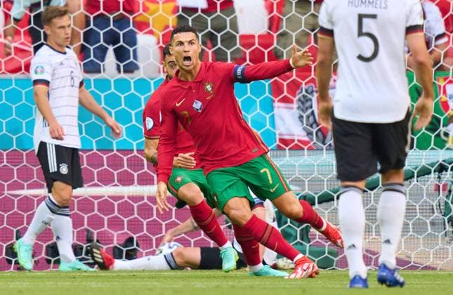 Cristiano RONALDO, Por 7 scores, shoots goal , Tor, Treffer, 1-0, celebrates his goal, happy, laugh, celebration, in the Group F match PORTUGAL - GERMANY 2-4 at the football UEFA European Championships 2020 in Season 2020 2021 on June 19, 2021 in Munich, Germany.