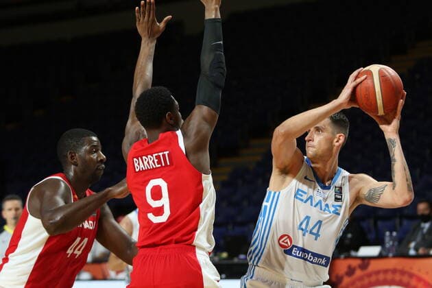 June 29, 2021, Victoria, BC, Canada: Canada s Andrew Nicholson, left, and teammate RJ Barrett defend against Greece s Mitoglou Konstantinos during first half FIBA Men s Olympic Qualifying basketball action at Memorial Arena in Victoria, Tuesday, June 29, 2021. Andrew Nicholson,RJ Barrett, Mitoglou Konstantinos - ZUMAc35_ 20210629_zaf_c35_022 Copyright: xChadxHipolitox