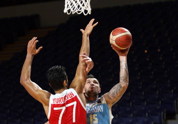 June 29, 2021, Victoria, BC, Canada: Turkey s Omer Faruk Yurtseven, left, tries to block Uruguay s Esteban Batista from scoring a basket during first half FIBA Men s Olympic Qualifying basketball action at Memorial Arena in Victoria, Tuesday, June 29, 2021. Esteban Batista,Omer Faruk Yurtseven - ZUMAc35_ 20210629_zaf_c35_040 Copyright: xChadxHipolitox