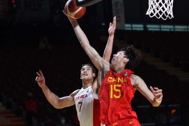 June 30, 2021, Victoria, BC, Canada: Canada s Dwight Powell battles with China s Qi Zhou during the first half of FIBA Men s Olympic Qualifying basketball action at Memorial Arena in Victoria, B.C., on Wednesday, June 30, 2021. Dwight Powell, Qi Zhou, - ZUMAc35_ 20210630_zaf_c35_057 Copyright: xChadxHipolitox