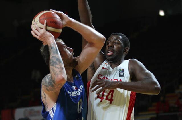 July 3, 2021, Victoria, BC, Canada: Canada s Andrew Nicholson, right, tries to block Czech Republic s Ondrej Balvin during first half FIBA Men s Olympic Qualifying semi-final basketball action at Memorial Arena in Victoria, Saturday, July 3, 2021. Andrew Nicholson,Ondrej Balvin - ZUMAc35_ 20210703_zaf_c35_017 Copyright: xChadxHipolitox