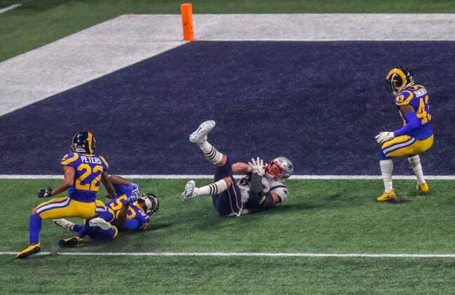 Mandatory Credit: Photo by Dave Shopland BPI Shutterstock (10081923cv) New England Patriots tight end Rob Gronkowski (87) catches the ball for 29 yards, the biggest gain of the day, evading LA Rams corner back Marcus Peters (22) and LA Rams inside linebacker Cory Littleton (58) Los Angeles Rams v New England Patriots, Super Bowl, Mercedes Benz Stadium, Atlanta, Georgia, USA, 03 Feb 2019 Los Angeles Rams v New England Patriots, Super Bowl, Mercedes Benz Stadium, Atlanta, Georgia, USA, 03 Feb 2019 Copyright: xDavexShopland BPI Shutterstockx 10081923cv