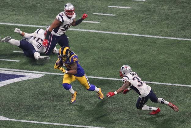 Mandatory Credit: Photo by Dave Shopland BPI Shutterstock (10081923et) LA Rams running back Todd Gurley (30) runs the ball as he evades New England Patriots defensive back Jonathan Jones (31) Los Angeles Rams v New England Patriots, Super Bowl, Mercedes Benz Stadium, Atlanta, Georgia, USA, 03 Feb 2019 Los Angeles Rams v New England Patriots, Super Bowl, Mercedes Benz Stadium, Atlanta, Georgia, USA, 03 Feb 2019 Copyright: xDavexShopland BPI Shutterstockx 10081923et