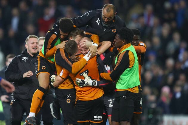Mandatory Credit: Photo by Kieran Mcmanus BPI Shutterstock (9569124ck) Wolverhampton Wanderers manager Nuno Espirito Santo joins in with his players to mob goalkeeper John Ruddy on the final whistle Cardiff City v Wolverhampton Wanderers, EFL Sky Bet Championship, Cardiff City Stadium, Cardiff, UK - 06 Apr 2018 EDITORIAL USE ONLY No use with unauthorised audio, video, data, fixture lists (outside the EU), club league logos or live services. Online in-match use limited to 45 images (+15 in extra time). No use to emulate moving images. No use in betting, games or single club league player publications services. Cardiff City v Wolverhampton Wanderers, EFL Sky Bet Championship, Cardiff City Stadium, Cardiff, UK - 06 Apr 2018 EDITORIAL USE ONLY No use with unauthorised audio, video, data, fixture lists (outside the EU), club league logos or live services. Online in-match use limited to 45 images (+15 in extra time). No use to emulate moving images. No use in betting, games or Copyright: xKieranxMcmanus BPI Shutterstockx 9569124ck
