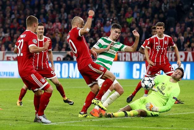 Mandatory Credit: Photo by James Marsh BPI Shutterstock (9146729ch) Craig Gordon of Celtic makes a save from Arjen Robben of Bayern Munich. Bayern Munich v Celtic, UEFA Champions League, Group B, Allianz Arena, Munich, Germany, 18 October 2017 EDITORIAL USE ONLY No use with unauthorised audio, video, data, fixture lists, club league logos or live services. Online in-match use limited to 75 images, no video emulation. No use in betting, games or single club league player publications. Bayern Munich v Celtic, UEFA Champions League, Group B, Allianz Arena, Munich, Germany, 18 October 2017 EDITORIAL USE ONLY No use with unauthorised audio, video, data, fixture lists, club league logos or live services. Online in-match use limited to 75 images, no video emulation. No use in betting, games or single club league player publications. Copyright: xJamesxMarsh BPI Shutterstockx 9146729ch