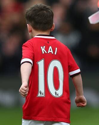 Mandatory Credit: Photo by Kieran Mcmanus BPI Shutterstock (4532242ay) Kai Rooney wearing a Manchester United, ManU shirt with his name and his father Wayne s number 10 Barclays Premier League 2014 15 Manchester United v Tottenham Hotspur Old Trafford, Sir Matt Busby Way, Manchester, United Kingdom - 15 Mar 2015 EDITORIAL USE ONLY No use with unauthorised audio, video, data, fixture lists (outside the EU), club league logos or live services. Online in-match use limited to 45 images (+15 in extra time). No use to emulate moving images. No use in betting, games or single club league player publications services. Barclays Premier League 2014 15 Manchester United v Tottenham Hotspur Old Trafford, Sir Matt Busby Way, Manchester, United Kingdom - 15 Mar 2015 EDITORIAL USE ONLY No use with unauthorised audio, video, data, fixture lists (outside the EU), club league logos or live services. Online in-match use limited to 45 images (+15 in extra time). No use to emulate moving images. No use in betting, games or Copyright: xKieranxMcmanus BPI Shutterstockx 4532242ay