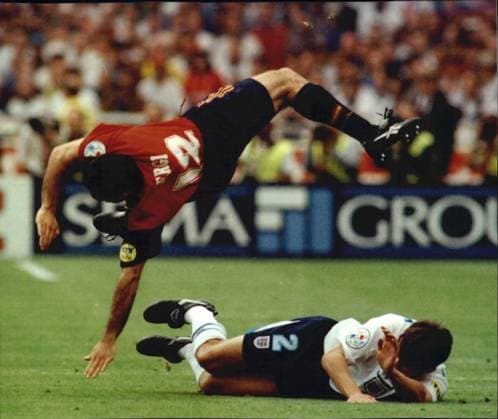 Mandatory Credit: Photo by Andy Hooper ANL Shutterstock (1338604a) Football Interntional European Championship, EM, Europameisterschaft 1996 Quarter Final Match England V Spain (england Win 4-2 On Penalties) Gary Neville Brings Down Sergi Barjaun Football Interntional European Championship 1996 Quarter Final Match England V Spain (england Win 4-2 On Penalties) Gary Neville Brings Down Sergi Barjaun EDITORIAL USE ONLY No use with unauthorised audio, video, data, fixture lists (outside the EU), club league logos or live services. Online in-match use limited to 45 images (+15 in extra time). No use to emulate moving images. No use in betting, games or single club league player publications services. Football Interntional European Championship 1996 Quarter Final Match England V Spain (england Win 4-2 On Penalties) Gary Neville Brings Down Sergi Barjaun EDITORIAL USE ONLY No use with unauthorised audio, video, data, fixture lists (outside the EU), club league logos or live services. Online in-match use limited to 45 images (+15 in extra time). No use to emulate moving images. No use in betting, games or Copyright: xAndyxHooper ANL Shutterstockx 1338604a