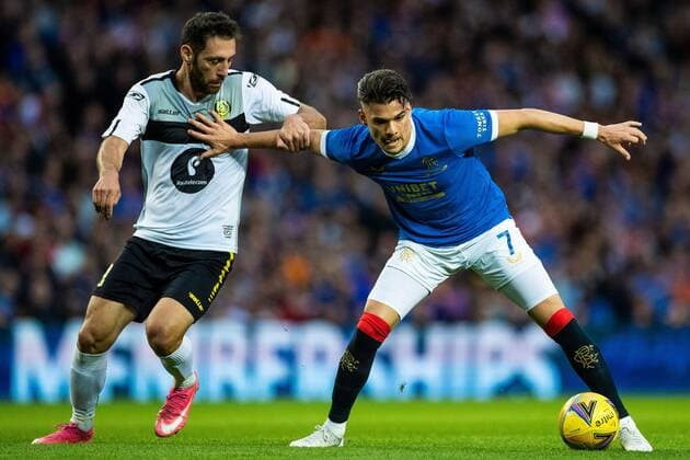 Mandatory Credit: Photo by Kirk O Rourke Rangers FC Shutterstock (12337251w) Ianis Hagi of Rangers holds off Rumyan Hovsepyan of FC Alashkert during the Europa League qualifying match at Ibrox Stadium, Glasgow. Rangers v Alashkert, UEFA Europa League Qualifying Play-off, Ibrox Staiudm, Glasgow, Scotland, UK - 19 Aug 2021 Rangers v Alashkert, UEFA Europa League Qualifying Play-off, Ibrox Staiudm, Glasgow, Scotland, UK - 19 Aug 2021 Copyright: xKirkxO Rourke RangersxFC Shutterstockx 12337251w
