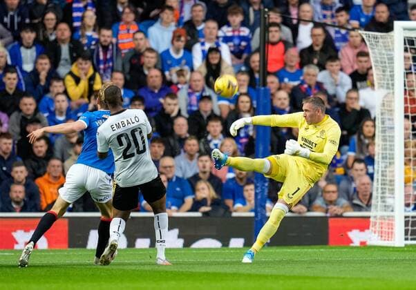 Mandatory Credit: Photo by Stuart Wallace Shutterstock (12337253aj) Rangers goalkeeper Allan McGregor clears the ball away from Jose Embalo of Alashkert, with Filip Helander of Rangers, left. Rangers v Alashkert, UEFA Europa League Qualifying Play-off, Ibrox Staiudm, Glasgow, Scotland, UK - 19 Aug 2021 Editorial use only Rangers v Alashkert, UEFA Europa League Qualifying Play-off, Ibrox Staiudm, Glasgow, Scotland, UK - 19 Aug 2021 Editorial use only Copyright: xStuartxWallace Shutterstockx 12337253aj