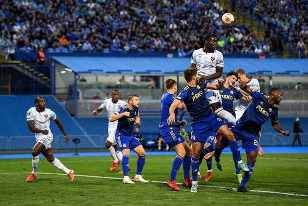 Mandatory Credit: Photo by Simon Dael Shutterstock (12446971bj) Kurt Zouma of West Ham United heads Dinamo Zagreb v West Ham United, UEFA Europa League, Group H, Football, Stadion Maksimir, Zagreb, Croatia - 16 Sep 2021 EDITORIAL USE ONLY No use with unauthorised audio, video, data, fixture lists, club league logos or live services. Online in-match use limited to 120 images, no video emulation. No use in betting, games or single club league player publications. Dinamo Zagreb v West Ham United, UEFA Europa League, Group H, Football, Stadion Maksimir, Zagreb, Croatia - 16 Sep 2021 EDITORIAL USE ONLY No use with unauthorised audio, video, data, fixture lists, club league logos or live services. Online in-match use limited to 120 images, no video emulation. No use in betting, games or single club league player publications. Copyright: xSimonxDael Shutterstockx 12446971bj