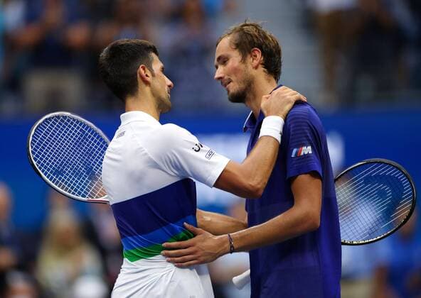Mandatory Credit: Photo by Ella Ling Shutterstock (12437757cx) Daniil Medvedev celebrates winning the final and is congratulated by Novak Djokovic US Open Championships 2021, Day Fourteen, USTA National Tennis Center, Flushing Meadows, New York, USA - 12 Sep 2021 US Open Championships 2021, Day Fourteen, USTA National Tennis Center, Flushing Meadows, New York, USA - 12 Sep 2021 Copyright: xEllaxLing Shutterstockx 12437757cx