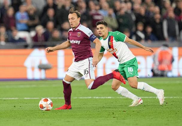 Mandatory Credit: Photo by Joe Toth Shutterstock (12516245bf) Mark Noble of West Ham and Dejan Petrovic of Rapid Vienna West Ham United v Rapid Vienna, UEFA Europa League, Group H, Football, The London Stadium, London, UK - 30 Sep 2021 EDITORIAL USE ONLY No use with unauthorised audio, video, data, fixture lists, club league logos or live services. Online in-match use limited to 120 images, no video emulation. No use in betting, games or single club league player publications. West Ham United v Rapid Vienna, UEFA Europa League, Group H, Football, The London Stadium, London, UK - 30 Sep 2021 EDITORIAL USE ONLY No use with unauthorised audio, video, data, fixture lists, club league logos or live services. Online in-match use limited to 120 images, no video emulation. No use in betting, games or single club league player publications. Copyright: xJoexToth Shutterstockx 12516245bf