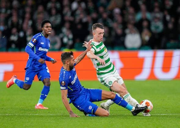 Mandatory Credit: Photo by Stuart Wallace Shutterstock (12516265ad) Kerem Demirbay of Bayer 04 Leverkusen tackles David Turnbull of Celtic Celtic v Bayer Leverkusen, UEFA Europa League, Group G, Football, Celtic Park, Glasgow, UK - 30 Sep 2021 EDITORIAL USE ONLY No use with unauthorised audio, video, data, fixture lists, club league logos or live services. Online in-match use limited to 120 images, no video emulation. No use in betting, games or single club league player publications. Celtic v Bayer Leverkusen, UEFA Europa League, Group G, Football, Celtic Park, Glasgow, UK - 30 Sep 2021 EDITORIAL USE ONLY No use with unauthorised audio, video, data, fixture lists, club league logos or live services. Online in-match use limited to 120 images, no video emulation. No use in betting, games or single club league player publications. Copyright: xStuartxWallace Shutterstockx 12516265ad