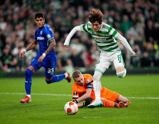 Mandatory Credit: Photo by Stuart Wallace Shutterstock (12516265ak) Kyogo Furuhashi of Celtic beats Bayer 04 Leverkusen goalkeeper Lukas Hradecky Celtic v Bayer Leverkusen, UEFA Europa League, Group G, Football, Celtic Park, Glasgow, UK - 30 Sep 2021 EDITORIAL USE ONLY No use with unauthorised audio, video, data, fixture lists, club league logos or live services. Online in-match use limited to 120 images, no video emulation. No use in betting, games or single club league player publications. Celtic v Bayer Leverkusen, UEFA Europa League, Group G, Football, Celtic Park, Glasgow, UK - 30 Sep 2021 EDITORIAL USE ONLY No use with unauthorised audio, video, data, fixture lists, club league logos or live services. Online in-match use limited to 120 images, no video emulation. No use in betting, games or single club league player publications. Copyright: xStuartxWallace Shutterstockx 12516265ak