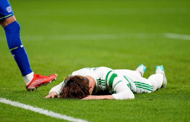 Mandatory Credit: Photo by Stuart Wallace Shutterstock (12516265aw) Kyogo Furuhashi of Celtic lays on the pitch after he was dispossessed as he tried to shoot into an empty goal after he beat Bayer 04 Leverkusen goalkeeper Lukas Hradecky Celtic v Bayer Leverkusen, UEFA Europa League, Group G, Football, Celtic Park, Glasgow, UK - 30 Sep 2021 EDITORIAL USE ONLY No use with unauthorised audio, video, data, fixture lists, club league logos or live services. Online in-match use limited to 120 images, no video emulation. No use in betting, games or single club league player publications. Celtic v Bayer Leverkusen, UEFA Europa League, Group G, Football, Celtic Park, Glasgow, UK - 30 Sep 2021 EDITORIAL USE ONLY No use with unauthorised audio, video, data, fixture lists, club league logos or live services. Online in-match use limited to 120 images, no video emulation. No use in betting, games or single club league player publications. Copyright: xStuartxWallace Shutterstockx 12516265aw