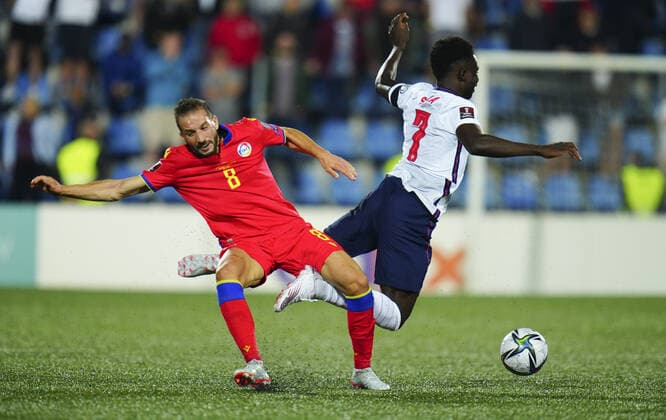 Mandatory Credit: Photo by Javier Garcia Shutterstock (12530028aa) Márcio Vieira of Andorra tackles Bukayo Saka of England Andorra v England, FIFA World Cup, WM, Weltmeisterschaft, Fussball 2022 Qualifying, Group I, Football, Estadi Nacional, Andorra la Vella, Andorra - 09 Oct 2021 EDITORIAL USE ONLY No use with unauthorised audio, video, data, fixture lists, club league logos or live services. Online in-match use limited to 120 images, no video emulation. No use in betting, games or single club league player publications. Andorra v England, FIFA World Cup 2022 Qualifying, Group I, Football, Estadi Nacional, Andorra la Vella, Andorra - 09 Oct 2021 EDITORIAL USE ONLY No use with unauthorised audio, video, data, fixture lists, club league logos or live services. Online in-match use limited to 120 images, no video emulation. No use in betting, games or single club league player publications. Copyright: xJavierxGarcia Shutterstockx 12530028aa