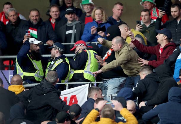Mandatory Credit: Photo by Matt Impey Shutterstock (12534940j) Crowd trouble after Police move in to arrest a Hungary fan for racial aggravation and they fight back eventually resulting in the Policbacking away from the situation England v Hungary, Football, World Cup Qualifying, Group I, Wembley Stadium, Wembley, London, UK - 12 10 2021 Editorial use only England v Hungary, Football, World Cup Qualifying, Group I, Wembley Stadium, Wembley, London, UK - 12 10 2021 Editorial use only Copyright: xMattxImpey Shutterstockx 12534940j