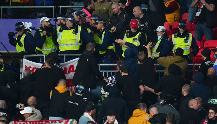 Mandatory Credit: Photo by Javier Garcia Shutterstock (12534018fd) Hungary fans clash with police England v Hungary, FIFA World Cup, WM, Weltmeisterschaft, Fussball 2022 Qualifying, Group I, Football, Wembley Stadium, London, UK - 12 Oct 2021 EDITORIAL USE ONLY No use with unauthorised audio, video, data, fixture lists, club league logos or live services. Online in-match use limited to 120 images, no video emulation. No use in betting, games or single club league player publications. England v Hungary, FIFA World Cup 2022 Qualifying, Group I, Football, Wembley Stadium, London, UK - 12 Oct 2021 EDITORIAL USE ONLY No use with unauthorised audio, video, data, fixture lists, club league logos or live services. Online in-match use limited to 120 images, no video emulation. No use in betting, games or single club league player publications. Copyright: xJavierxGarcia Shutterstockx 12534018fd