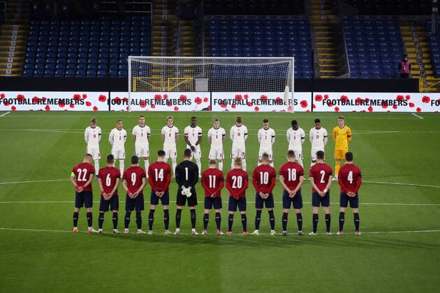 Mandatory Credit: Photo by Paul Greenwood Shutterstock (12598524c) England U21, U 21 and Czech Republic U21 players observe a minute silence ahead of klick-off England U21 v Czech Republic U21, UEFA U21 European Championship, EM, Europameisterschaft 2023 Qualifying, Group G, Football, Turf Moor, Burnley, UK - 11 Nov 2021 EDITORIAL USE ONLY No use with unauthorised audio, video, data, fixture lists, club league logos or live services. Online in-match use limited to 120 images, no video emulation. No use in betting, games or single club league player publications. England U21 v Czech Republic U21, UEFA U21 European Championship 2023 Qualifying, Group G, Football, Turf Moor, Burnley, UK - 11 Nov 2021 EDITORIAL USE ONLY No use with unauthorised audio, video, data, fixture lists, club league logos or live services. Online in-match use limited to 120 images, no video emulation. No use in betting, games or single club league player publications. Copyright: xPaulxGreenwood Shutterstockx 12598524c