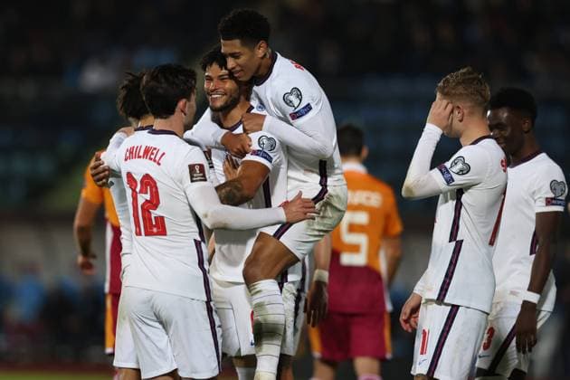 Fußball, WM Quali, San Marino - England Serravalle, Italy, 15th November 2021. Tyrone Mings of England celebrates with team mates after scoring to give the side a 7-0 lead during the FIFA World Cup, WM, Weltmeisterschaft, Fussball 2022 - European Qualifying match at San Marino Stadium, Serravalle. Picture credit should read: Jonathan Moscrop Sportimage EDITORIAL USE ONLY. No use with unauthorised audio, video, data, fixture lists, club league logos or live services. Online in-match use limited to 120 images, no video emulation. No use in betting, games or single club league player publications. SPI-1312-0036