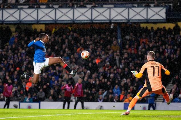 Mandatory Credit: Photo by Stuart Wallace Shutterstock (12617589q) Joe Aribo of Rangers volleys the ball over Sparta Prague goalkeeper Dominik Holec but his effort went over the crossbar. Rangers v Sparta Prague, UEFA Europa League, Group A, Football, Ibrox Stadium, Glasgow, UK - 25 Nov 2021 EDITORIAL USE ONLY No use with unauthorised audio, video, data, fixture lists, club league logos or live services. Online in-match use limited to 120 images, no video emulation. No use in betting, games or single club league player publications. Rangers v Sparta Prague, UEFA Europa League, Group A, Football, Ibrox Stadium, Glasgow, UK - 25 Nov 2021 EDITORIAL USE ONLY No use with unauthorised audio, video, data, fixture lists, club league logos or live services. Online in-match use limited to 120 images, no video emulation. No use in betting, games or single club league player publications. Copyright: xStuartxWallace Shutterstockx 12617589q