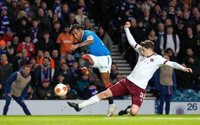 Mandatory Credit: Photo by Stuart Wallace Shutterstock (12617589ad) Alfredo Morelos of Rangers shoots under pressure from Ladislav Krejci II of Sparta Prague Rangers v Sparta Prague, UEFA Europa League, Group A, Football, Ibrox Stadium, Glasgow, UK - 25 Nov 2021 EDITORIAL USE ONLY No use with unauthorised audio, video, data, fixture lists, club league logos or live services. Online in-match use limited to 120 images, no video emulation. No use in betting, games or single club league player publications. Rangers v Sparta Prague, UEFA Europa League, Group A, Football, Ibrox Stadium, Glasgow, UK - 25 Nov 2021 EDITORIAL USE ONLY No use with unauthorised audio, video, data, fixture lists, club league logos or live services. Online in-match use limited to 120 images, no video emulation. No use in betting, games or single club league player publications. Copyright: xStuartxWallace Shutterstockx 12617589ad