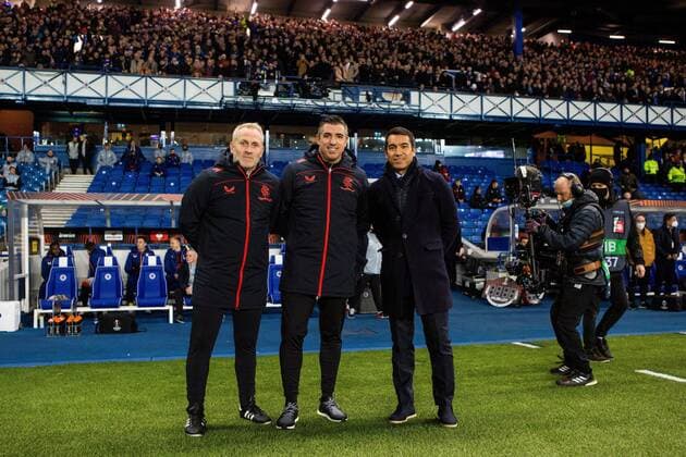 Mandatory Credit: Photo by Kirk O Rourke Rangers FC Shutterstock (12617967dr) Rangers manager Giovanni van Bronckhorst, Fitness coach Arno Phillps (left) and First team coach Roy Makaay at the start of the Europa League match at Ibrox Stadium, Glasgow. Rangers v Sparta Prague, UEFA Europa League, Group A, Football, Ibrox Stadium, Glasgow, UK - 25 Nov 2021 Rangers v Sparta Prague, UEFA Europa League, Group A, Football, Ibrox Stadium, Glasgow, UK - 25 Nov 2021 Copyright: xKirkxO Rourke RangersxFC Shutterstockx 12617967dr