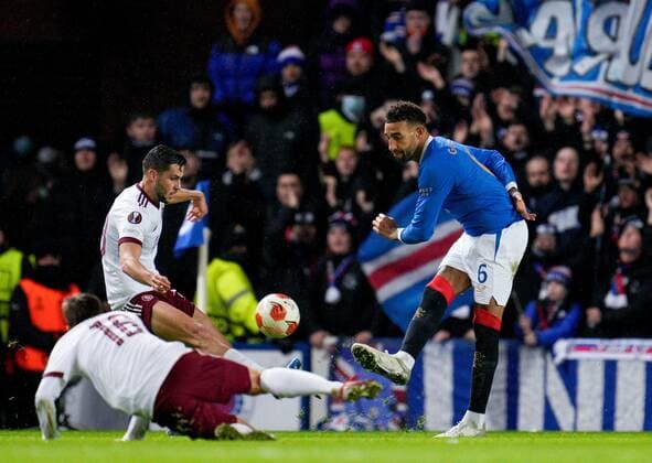 Mandatory Credit: Photo by Stuart Wallace Shutterstock (12617589ca) Connor Goldson of Rangers clears the ball away from Matej Pulkrab of Sparta Prague Rangers v Sparta Prague, UEFA Europa League, Group A, Football, Ibrox Stadium, Glasgow, UK - 25 Nov 2021 EDITORIAL USE ONLY No use with unauthorised audio, video, data, fixture lists, club league logos or live services. Online in-match use limited to 120 images, no video emulation. No use in betting, games or single club league player publications. Rangers v Sparta Prague, UEFA Europa League, Group A, Football, Ibrox Stadium, Glasgow, UK - 25 Nov 2021 EDITORIAL USE ONLY No use with unauthorised audio, video, data, fixture lists, club league logos or live services. Online in-match use limited to 120 images, no video emulation. No use in betting, games or single club league player publications. Copyright: xStuartxWallace Shutterstockx 12617589ca