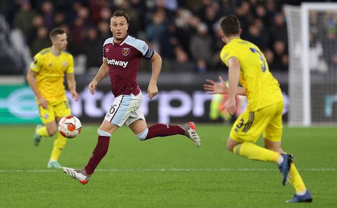 Mandatory Credit: Photo by Simon Dael Shutterstock (12637595ao) Mark Noble of West Ham West Ham United v Dinamo Zagreb, UEFA Europa League, Group H, Football, London Stadium, London, UK - 09 Dec 2021 EDITORIAL USE ONLY No use with unauthorised audio, video, data, fixture lists, club league logos or live services. Online in-match use limited to 120 images, no video emulation. No use in betting, games or single club league player publications. West Ham United v Dinamo Zagreb, UEFA Europa League, Group H, Football, London Stadium, London, UK - 09 Dec 2021 EDITORIAL USE ONLY No use with unauthorised audio, video, data, fixture lists, club league logos or live services. Online in-match use limited to 120 images, no video emulation. No use in betting, games or single club league player publications. Copyright: xSimonxDael Shutterstockx 12637595ao