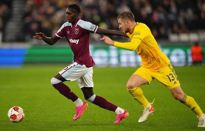 Mandatory Credit: Photo by Jed Leicester Shutterstock (12637592ba) Emmanuel Longelo of West Ham and Stefan Ristovski of Dinamo Zagreb in action West Ham United v Dinamo Zagreb, UEFA Europa League, Group H, Football, London Stadium, London, UK - 09 Dec 2021 EDITORIAL USE ONLY No use with unauthorised audio, video, data, fixture lists, club league logos or live services. Online in-match use limited to 120 images, no video emulation. No use in betting, games or single club league player publications. West Ham United v Dinamo Zagreb, UEFA Europa League, Group H, Football, London Stadium, London, UK - 09 Dec 2021 EDITORIAL USE ONLY No use with unauthorised audio, video, data, fixture lists, club league logos or live services. Online in-match use limited to 120 images, no video emulation. No use in betting, games or single club league player publications. Copyright: xJedxLeicester Shutterstockx 12637592ba