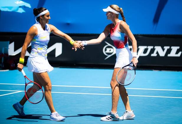 Mandatory Credit: Photo by Rob Prange Shutterstock (12763713fd) Caroline Garcia of France & Kristina Mladenovic of France in action during the first round of doubles of the 2022 Australian Open Grand Slam tennis tournament Australian Open, Day Three, Tennis, Melbourne Park, Melbourne, Australia - 19 Jan 2022 Australian Open, Day Three, Tennis, Melbourne Park, Melbourne, Australia - 19 Jan 2022 Copyright: xRobxPrange Shutterstockx 12763713fd