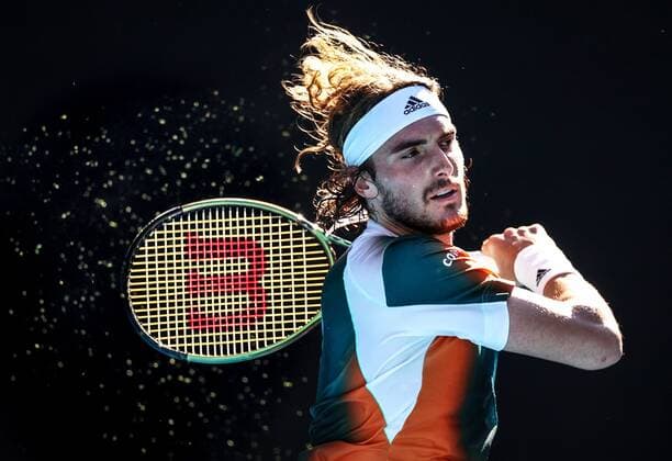 Mandatory Credit: Photo by Ella Ling Shutterstock (12765089bx) Stefanos Tsitsipas during his third round match Australian Open, Day Six, Tennis, Melbourne Park, Melbourne, Australia - 22 Jan 2022 Australian Open, Day Six, Tennis, Melbourne Park, Melbourne, Australia - 22 Jan 2022 Copyright: xEllaxLing Shutterstockx 12765089bx