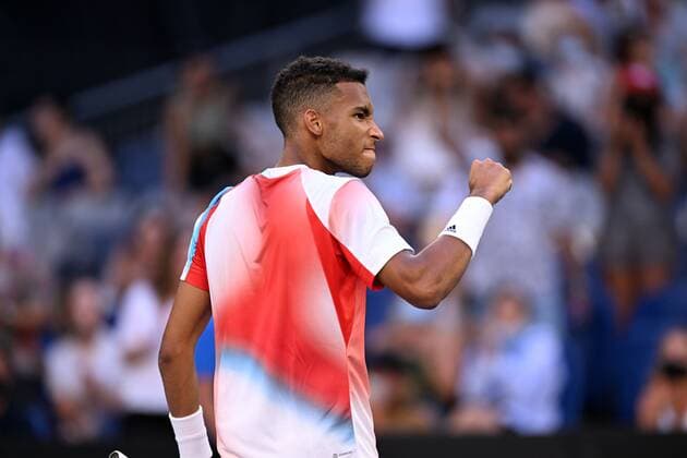 Mandatory Credit: Photo by James Gourley Shutterstock (12765088hx) Felix Auger-Aliassime celebrates victory in his third round match Australian Open, Day Six, Tennis, Melbourne Park, Melbourne, Australia - 22 Jan 2022 Australian Open, Day Six, Tennis, Melbourne Park, Melbourne, Australia - 22 Jan 2022 Copyright: xJamesxGourley Shutterstockx 12765088hx