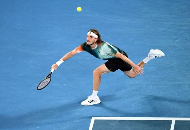 Mandatory Credit: Photo by James Gourley Shutterstock (12765100fv) Stefanos Tsitsipas during his fourth round match Australian Open, Day Eight, Tennis, Melbourne Park, Melbourne, Australia - 24 Jan 2022 Australian Open, Day Eight, Tennis, Melbourne Park, Melbourne, Australia - 24 Jan 2022 Copyright: xJamesxGourley Shutterstockx 12765100fv