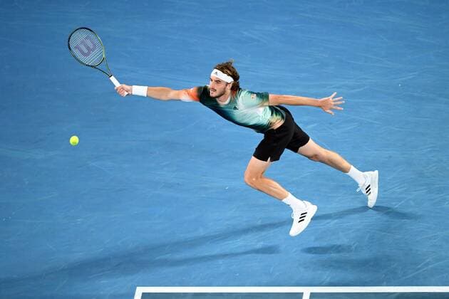 Mandatory Credit: Photo by James Gourley Shutterstock (12765100fy) Stefanos Tsitsipas during his fourth round match Australian Open, Day Eight, Tennis, Melbourne Park, Melbourne, Australia - 24 Jan 2022 Australian Open, Day Eight, Tennis, Melbourne Park, Melbourne, Australia - 24 Jan 2022 Copyright: xJamesxGourley Shutterstockx 12765100fy