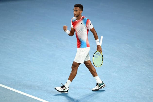 Mandatory Credit: Photo by James Gourley Shutterstock (12773754em) Felix Auger-Aliassime during his quarter final match Australian Open, Day Ten, Tennis, Melbourne Park, Melbourne, Australia - 26 Jan 2022 Australian Open, Day Ten, Tennis, Melbourne Park, Melbourne, Australia - 26 Jan 2022 Copyright: xJamesxGourley Shutterstockx 12773754em