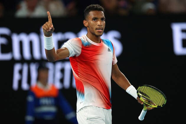 Mandatory Credit: Photo by Ella Ling Shutterstock (12773755dd) Felix Auger-Aliassime during his quarter final match Australian Open, Day Ten, Tennis, Melbourne Park, Melbourne, Australia - 26 Jan 2022 Australian Open, Day Ten, Tennis, Melbourne Park, Melbourne, Australia - 26 Jan 2022 Copyright: xEllaxLing Shutterstockx 12773755dd
